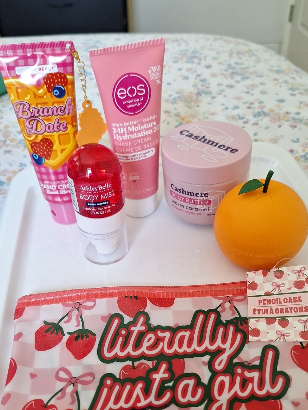 eos Pink Shave Cream with Strawberry-Themed Pink Gift Items